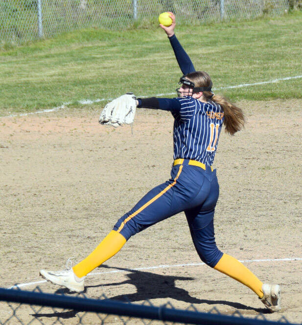 Homer’s Keagan Niebuhr delivers to Chugiak on Friday, May 9, 2025 during the Bash on the Bay tournament at Jack Gist Park in Homer, Alaska. (Chloe Pleznac/Homer News)