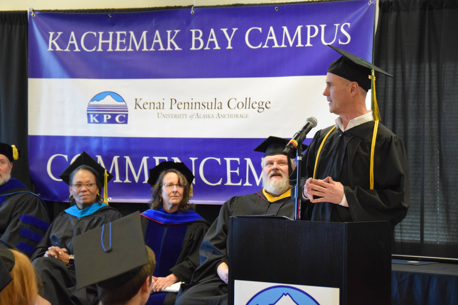 Darren Tivnan, Class of 2025 valedictorian, speaks to his fellow graduates during the 55th annual commencement ceremony on Wednesday, May 7, 2025, at Kachemak Bay Campus in Homer, Alaska. (Delcenia Cosman/Homer News)