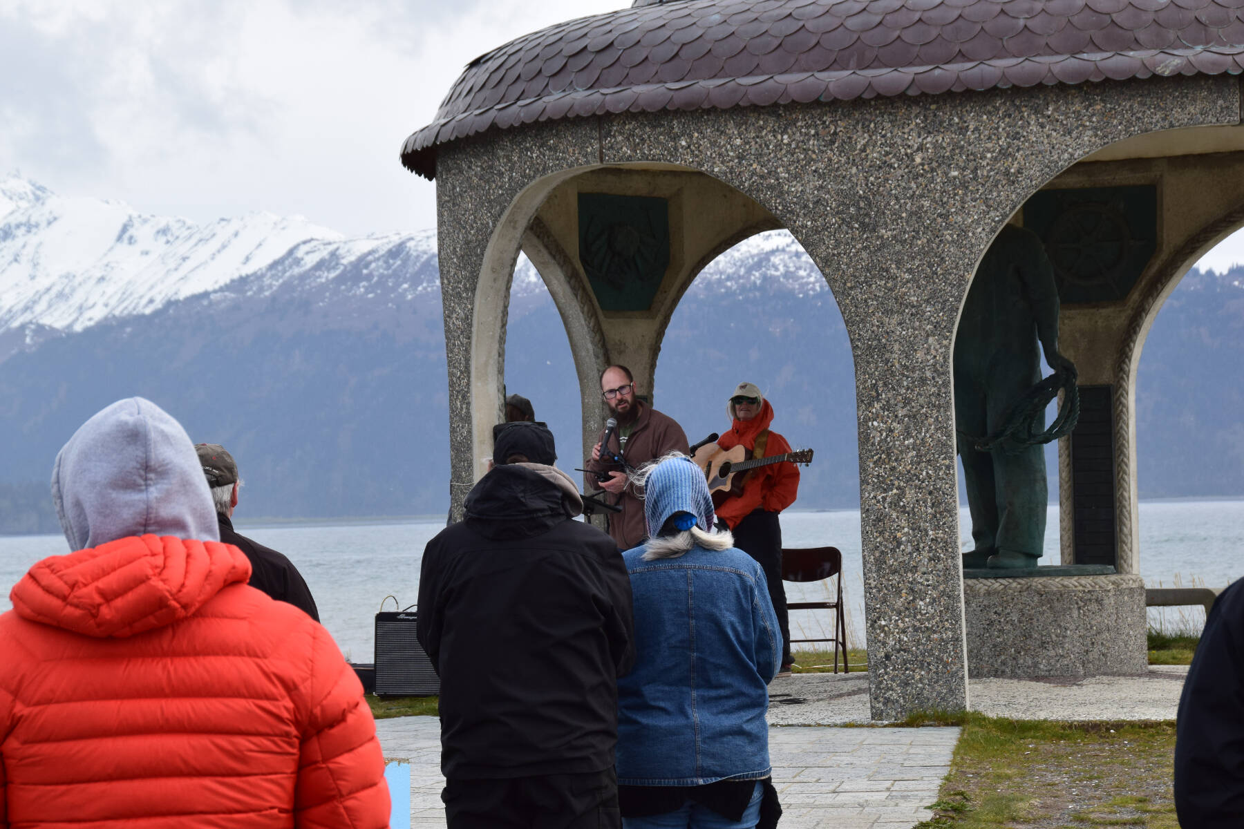 Pastor Jamie McBride addresses the crowd during the annual Blessing of the Fleet at the Seafarer’s Memorial in Homer, Alaska on Tuesday, May 20, 2025. (Chloe Pleznac/Homer News)