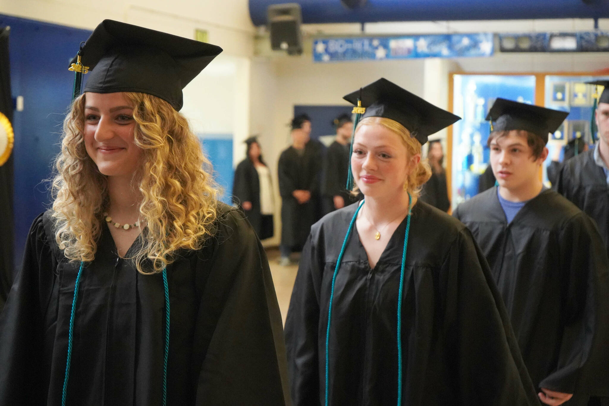 Students process into a graduation ceremony for Connections Homeschool in Soldotna, Alaska, on Thursday, May 22, 2025. (Jake Dye/Peninsula Clarion)
