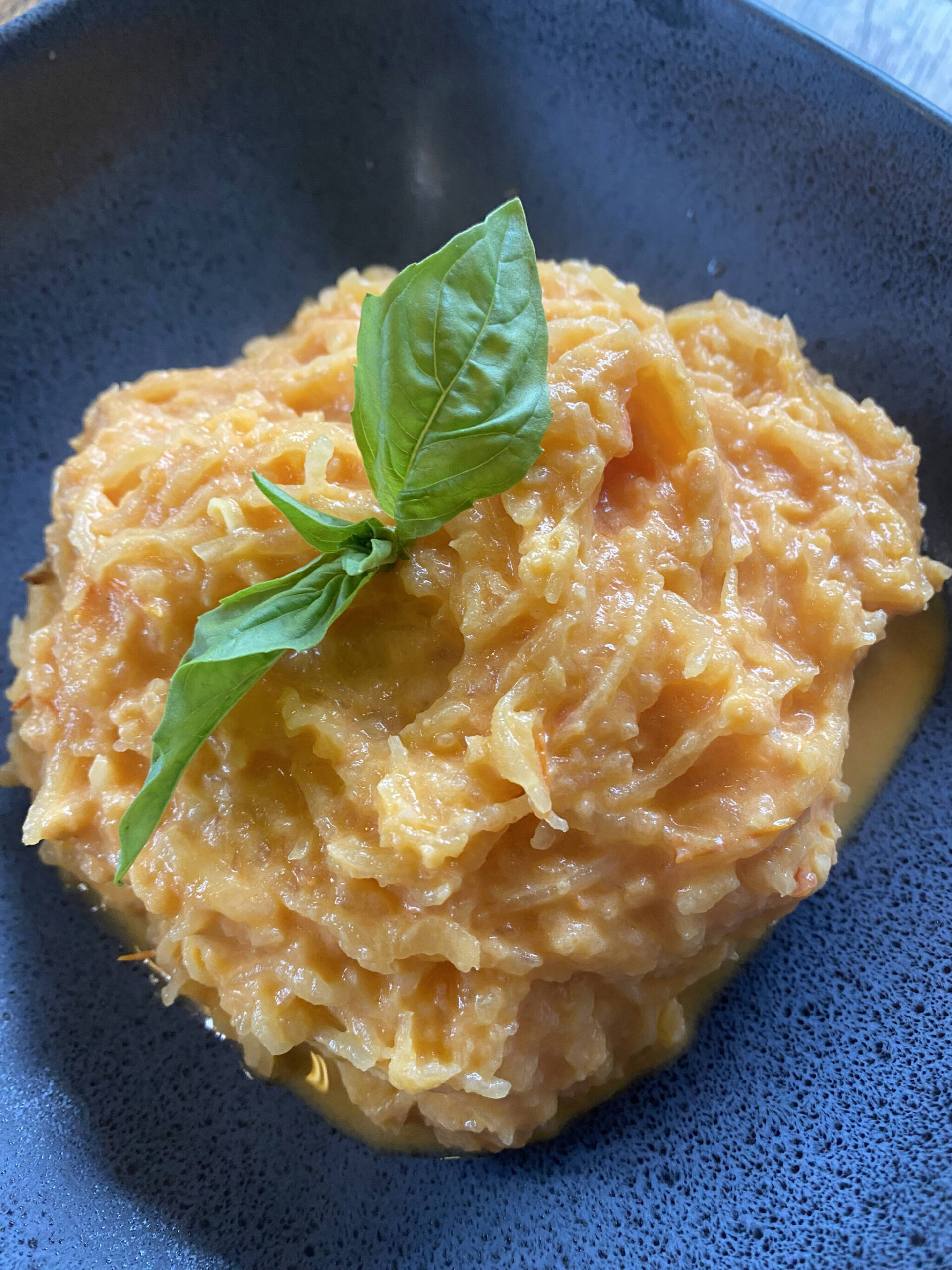 This sweet and tangy roasted spaghetti squash dish includes blended tomato and goat cheese sauce. (Photo by Tressa Dale/Peninsula Clarion)