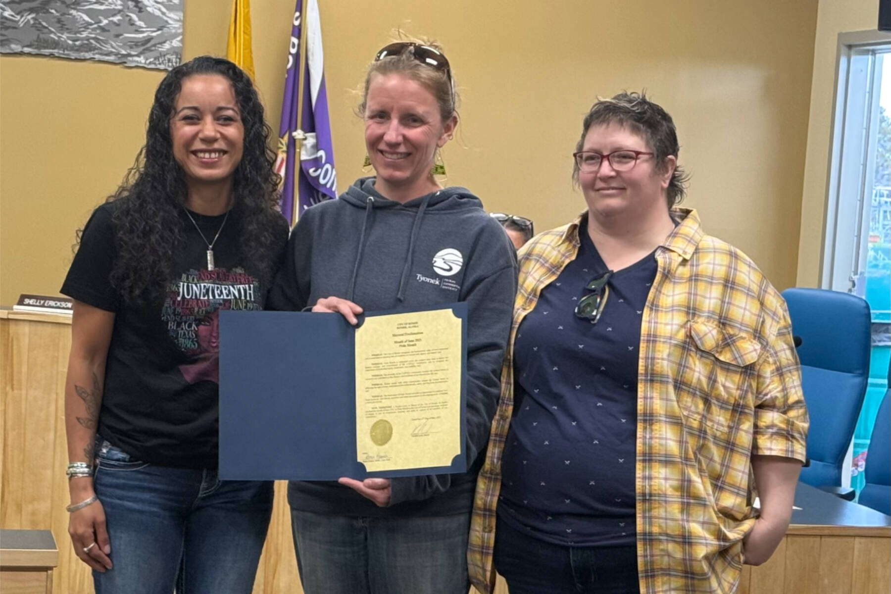Winter Marshall-Allen of the Homer Organization for More Equitable Relations, Homer Mayor Rachel Lord, and Jerrina Reed of Homer PRIDE pose for a photo after the mayoral proclamation recognizing June as Pride Month on Tuesday, May 27 at the Cowles Council Chambers. (Photo courtesy of Winter Marshall-Allen)