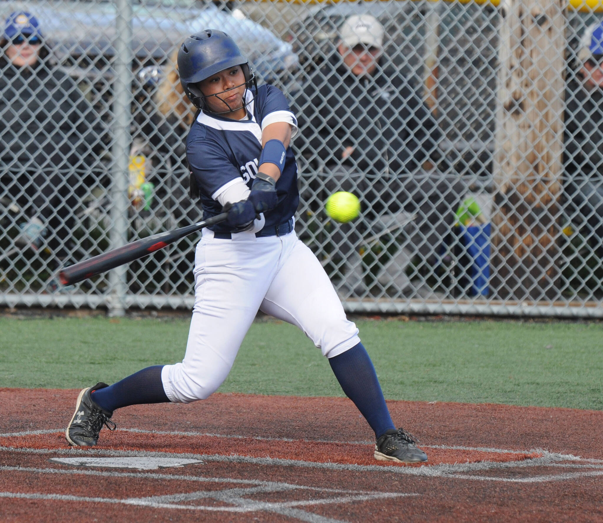 Soldotna’s Isabelle Cruz hits the ball against Kodiak during a winner’s bracket game of the Northern Lights Conference tournament Friday, May 30, 20205 at Baranof Field in Kodiak, Alaska. (DEREK CLARKSTON/Kodiak Daily Mirror)