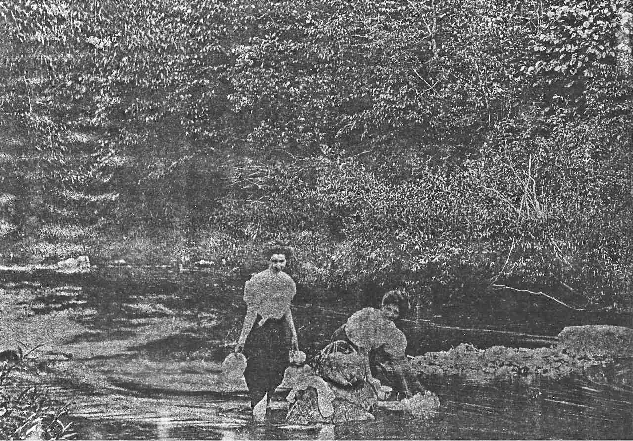 Photo courtesy of the Penney Family Collection
In this photocopy of a photo from about 1913, Mary Penney and her daughter Geraldine wash laundry in a creek near their homesteads in Ekalaka, Montana.