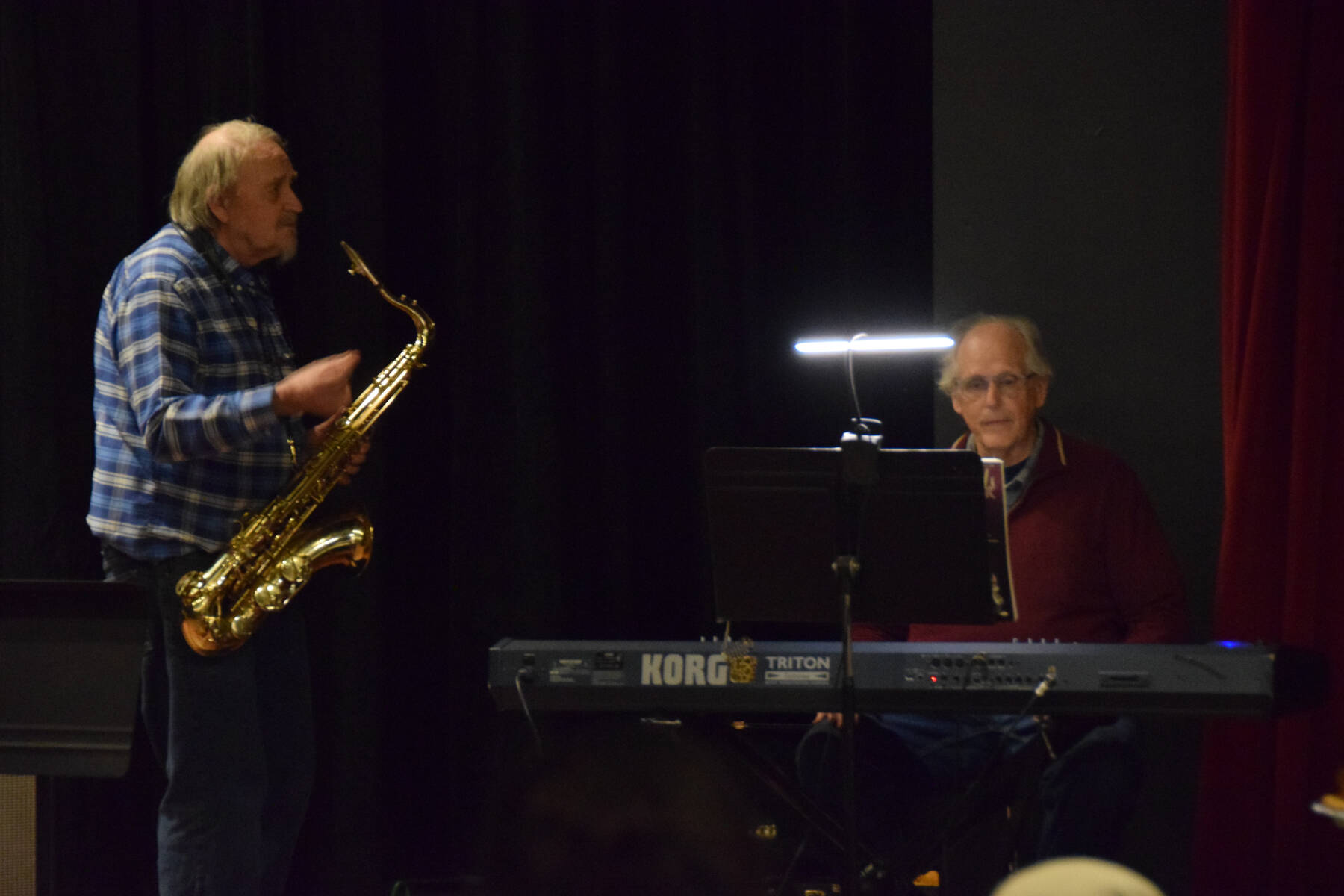 David Webster and Mark Robinson prepare to count off during the 2025 Mary Epperson Day celebration on May 30 at Pier One Theatre on the Spit. (Chloe Pleznac/Homer News)