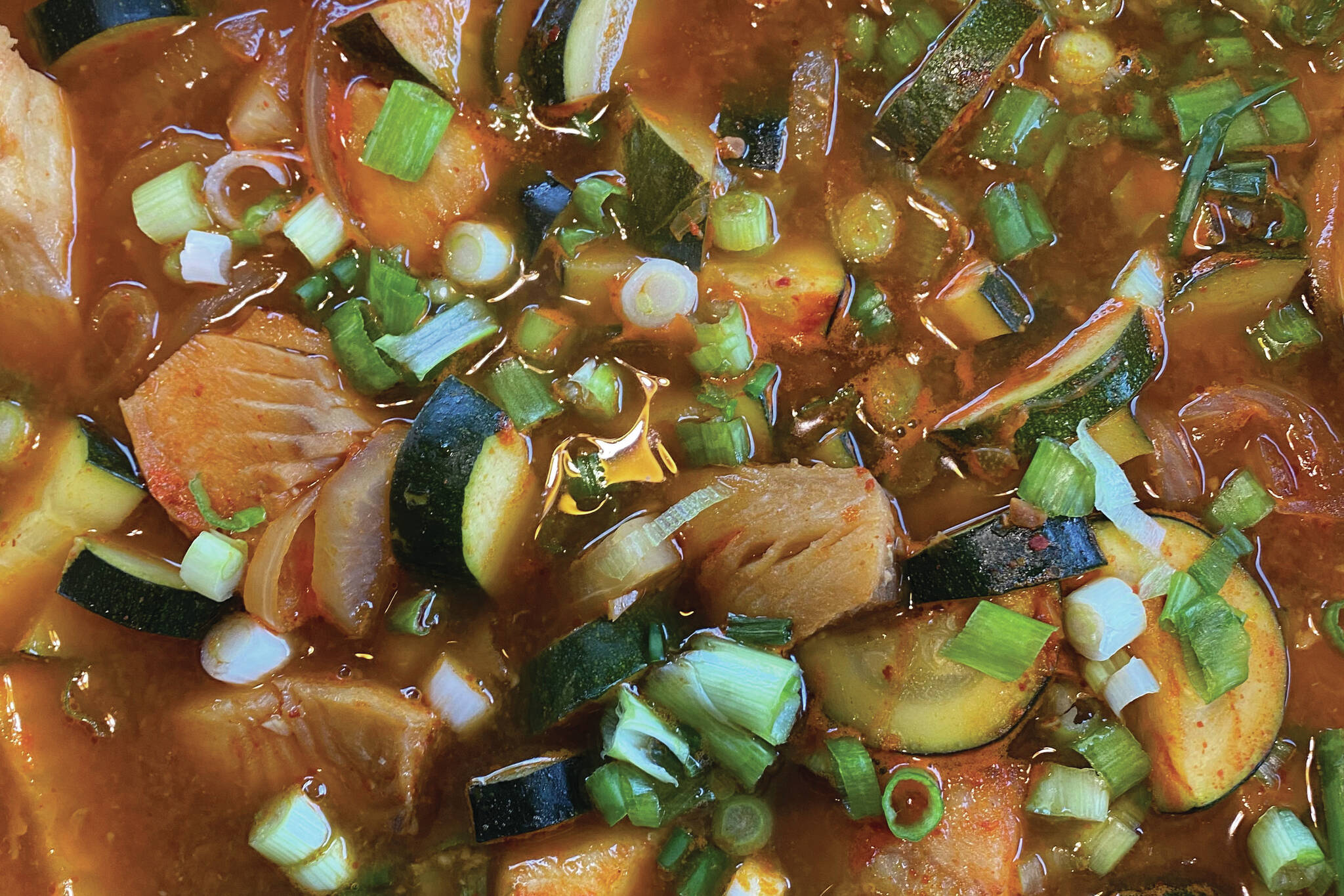 This version of maeuntang, or Korean fisherman’s stew, features sablefish, daikon, zucchini and green onions with fermented Korean bean and red pepper pastes. (Photo by Tressa Dale/Peninsula Clarion)