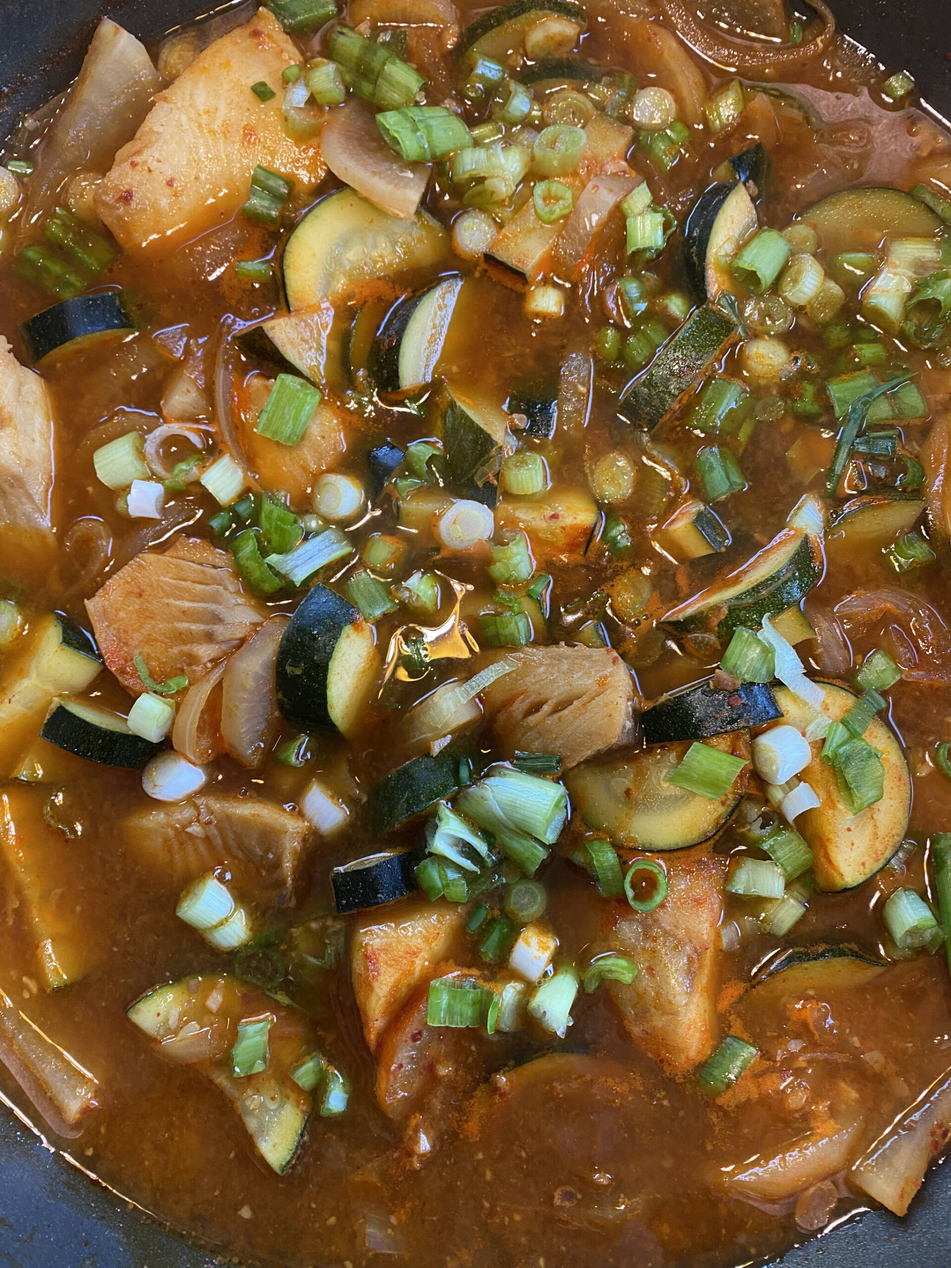 This version of maeuntang, or Korean fisherman’s stew, features sablefish, daikon, zucchini and green onions with fermented Korean bean and red pepper pastes. (Photo by Tressa Dale/Peninsula Clarion)