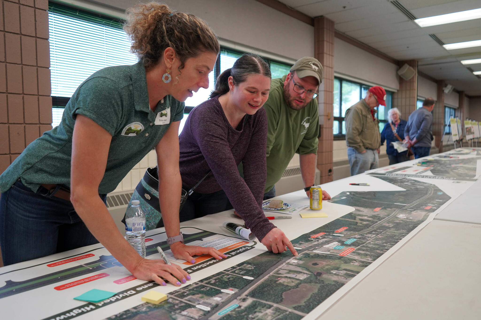 Leads for the Sterling Safety Corridor Improvements Project field questions and showcase their “preferred design” during an open house meeting at the Soldotna Regional Sports Complex in Soldotna, Alaska, on Tuesday, June 10, 2025. (Jake Dye/Peninsula Clarion)