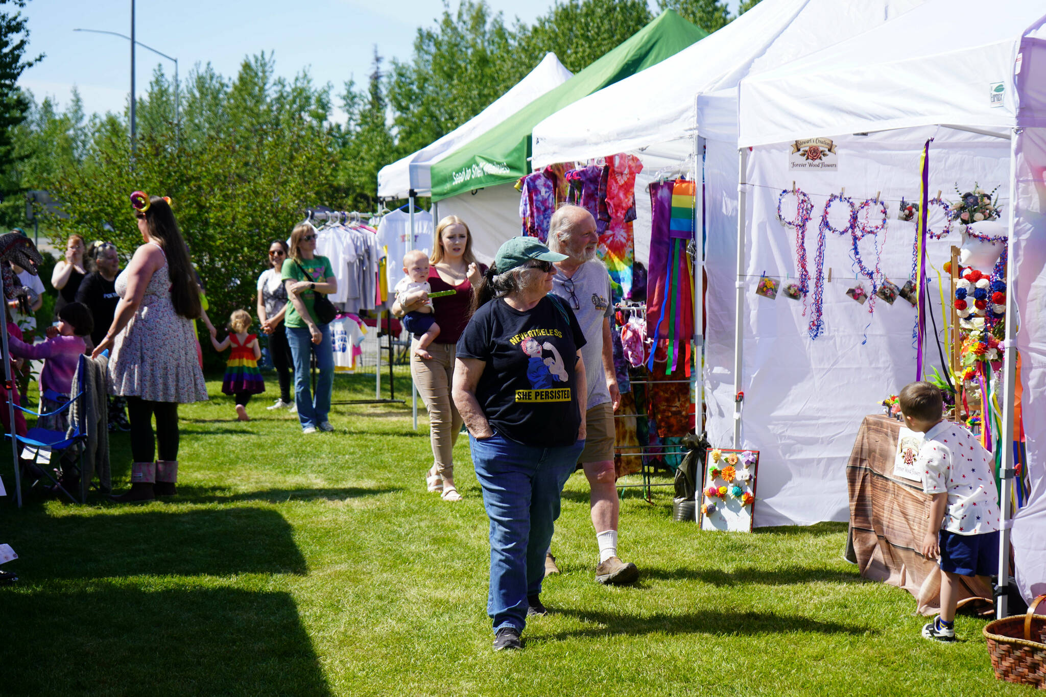 Shoppers mosey through the Saturday Market at the Goods in Soldotna, Alaska, on Saturday, June 14, 2025. (Jake Dye/Peninsula Clarion)