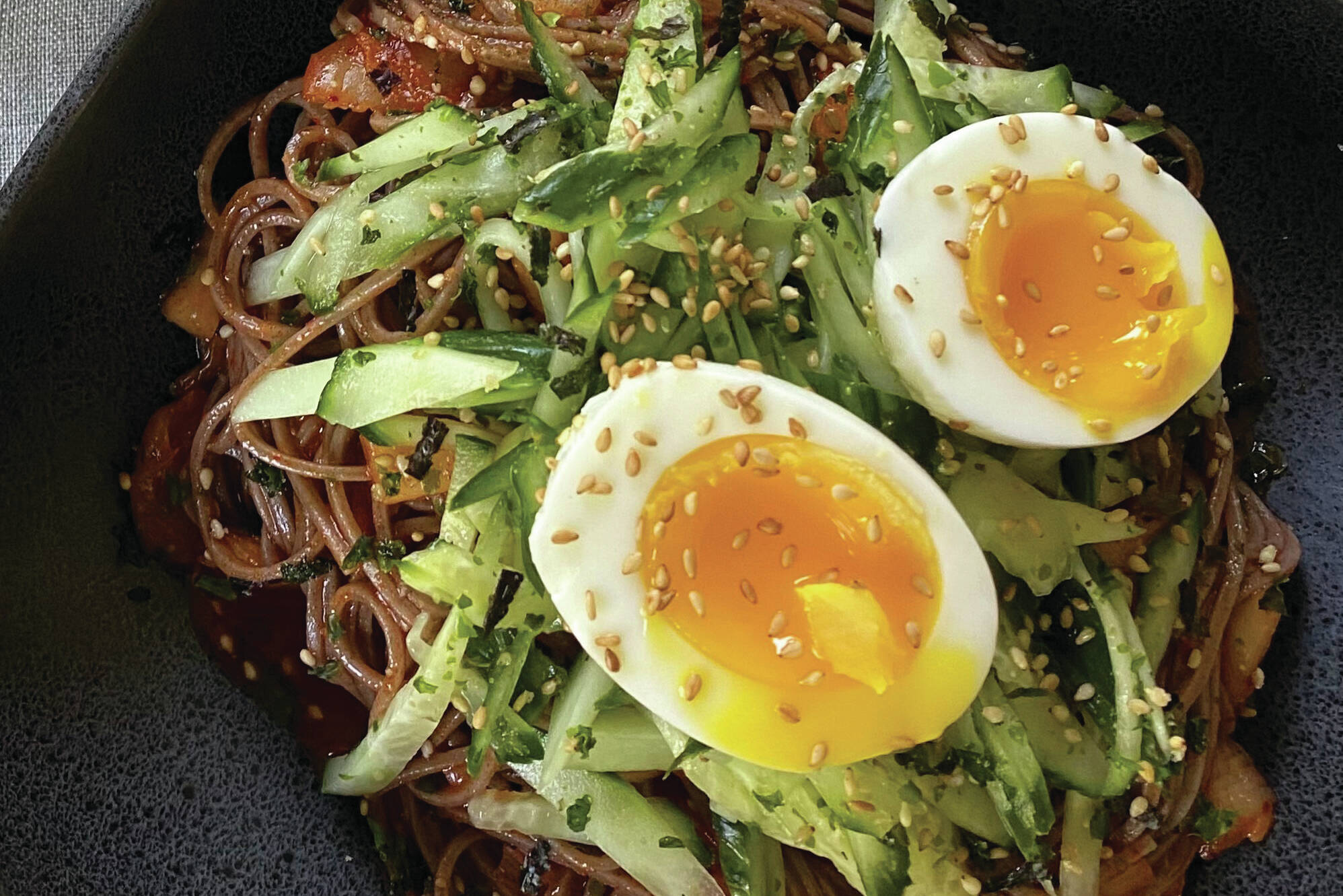 “Bibim guksu” or “mixed noodles” are traditionally served with a thin wheat flour noodle called somyeon (somen). (Photo by Tressa Dale/Peninsula Clarion)