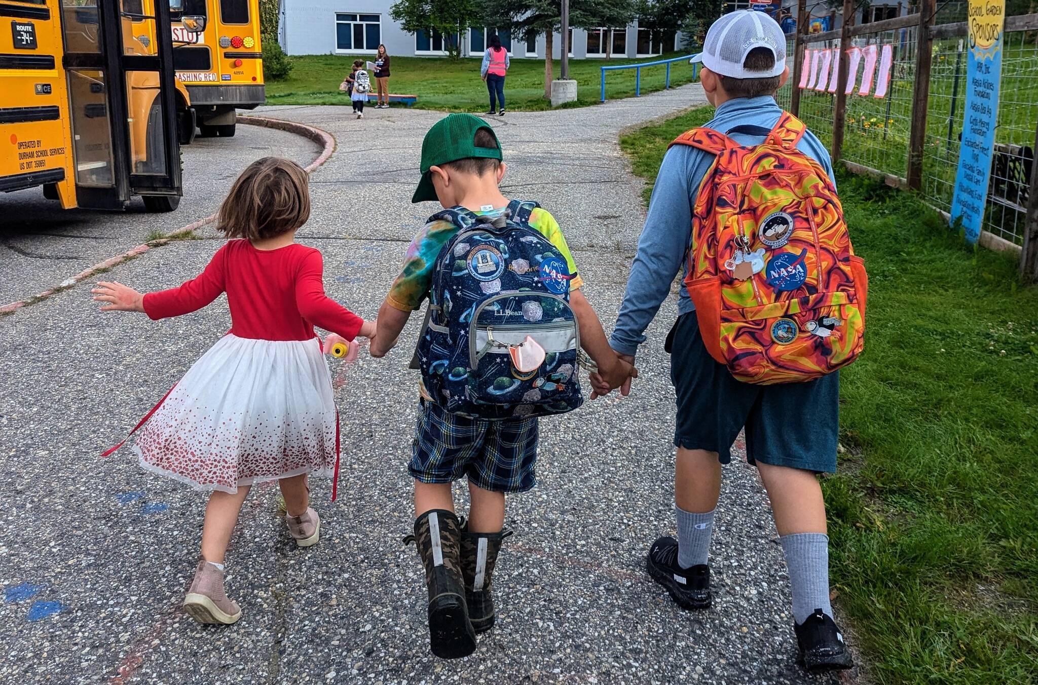 Children are photographed outside their now shuttered school, Pearl Creek Elementary, in August 2024 in Fairbanks, Alaska. (Photo provided by Morgan Dulian)