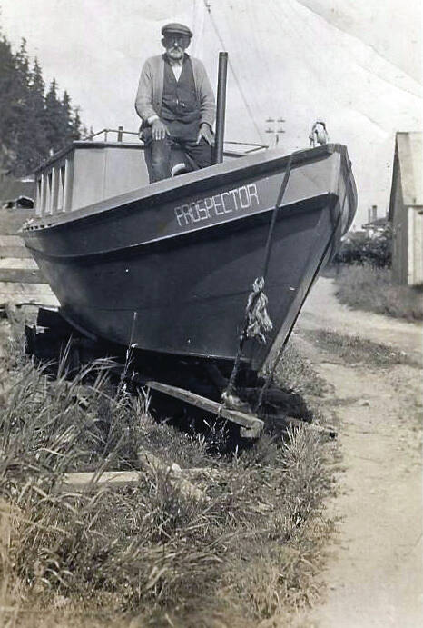 A skilled woodworker and craftsman, Steve Melchior poses in Seward with his pleasure boat, the Prospector, which he completed in August 1931. (Photo courtesy of the Melchior Family Collection)