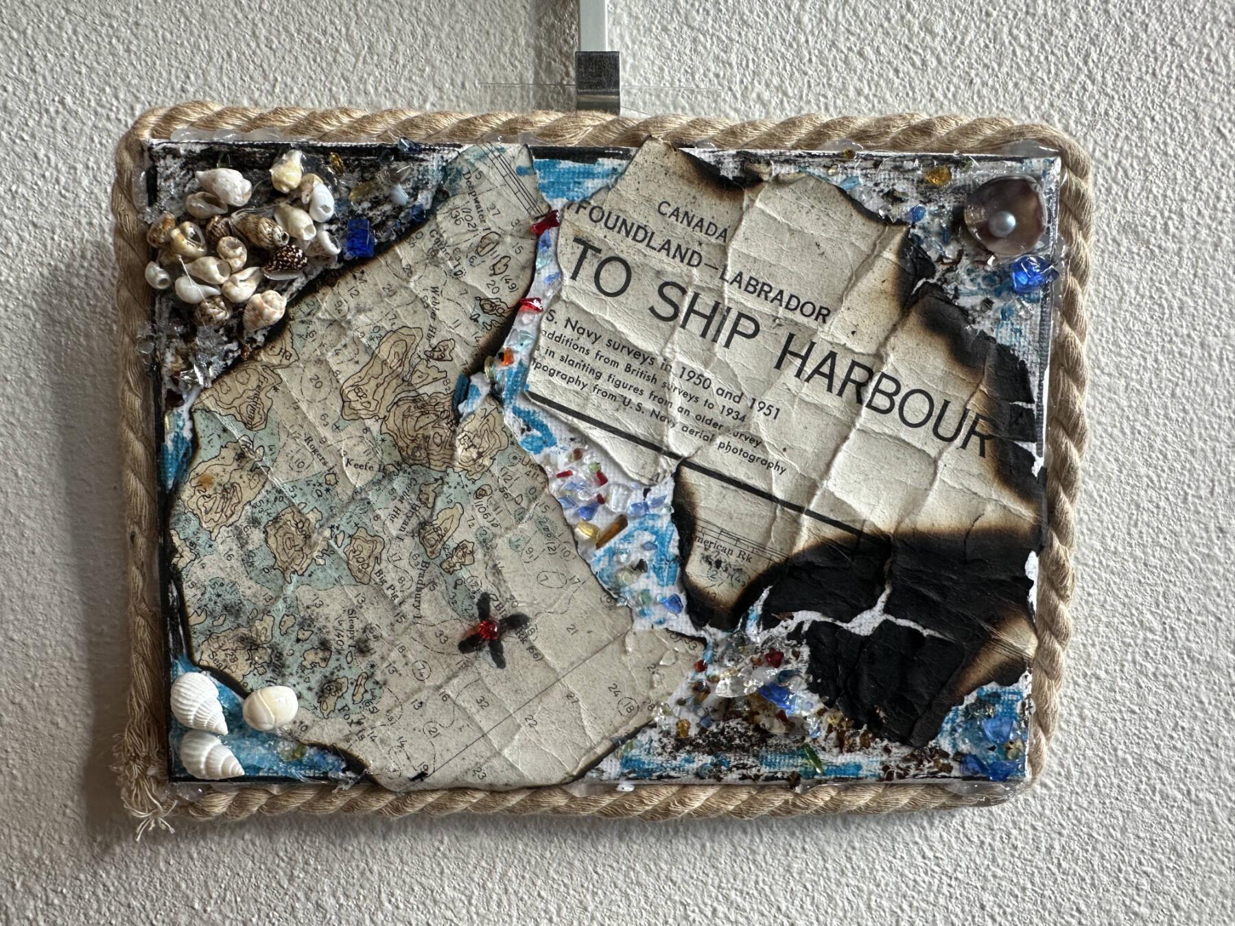 A mixed media piece currently on display through September in the Homer Public Librarys Fireplace Lounge is one of numerous works of art created by members of the Independent Living Centers Artability program in Homer, Alaska. Photo by Christina Whiting