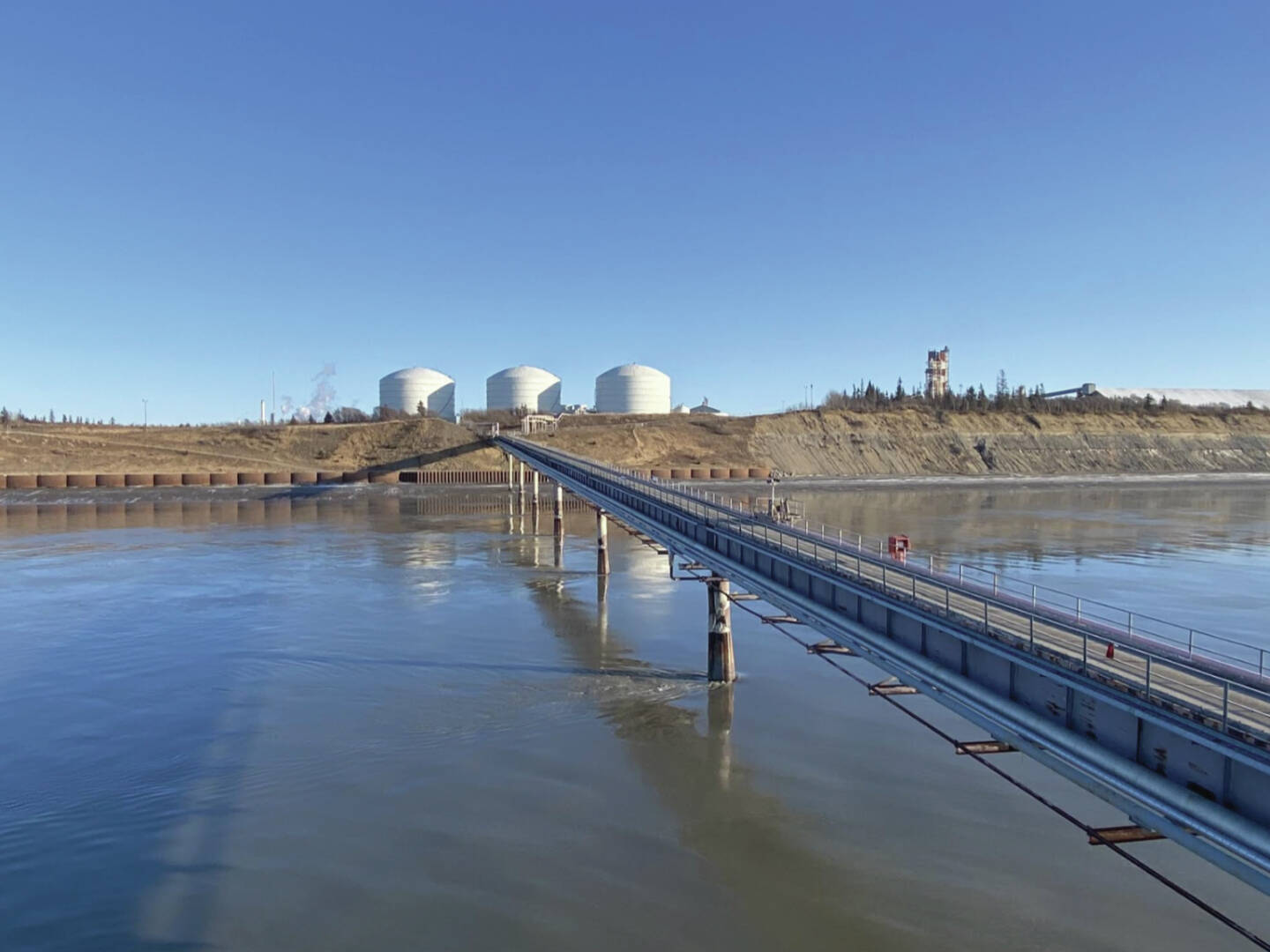 Courtesy Harvest
On the Kenai Peninsula, a dormant liquefied natural gas export plant could be repurposed to receive cargoes of imported LNG under a plan being studied by Harvest, an affiliate of oil and gas company Hilcorp. The fuel would be transferred from ships to the tanks on the left, still in liquid form, before being converted back into gas and sent into a pipeline.