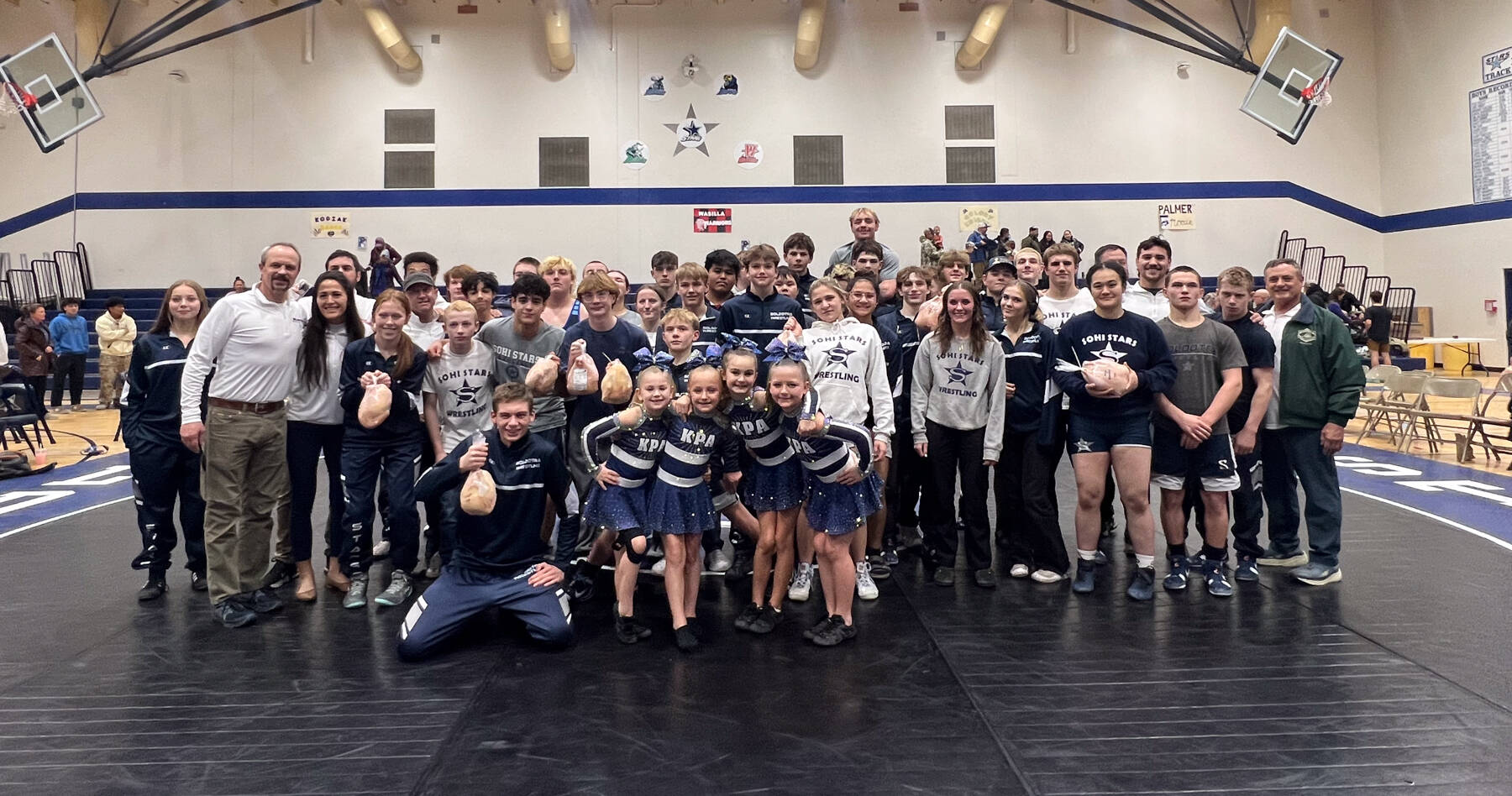 Photo courtesy Pete Dickinson
The SoHi junior varsity and varsity wrestling teams compete in the Battle for the Bird at Soldotna High School on Wednesday, Nov. 26. The Kenai Peninsula Athletics Sapphire dance team performed the halftime show.