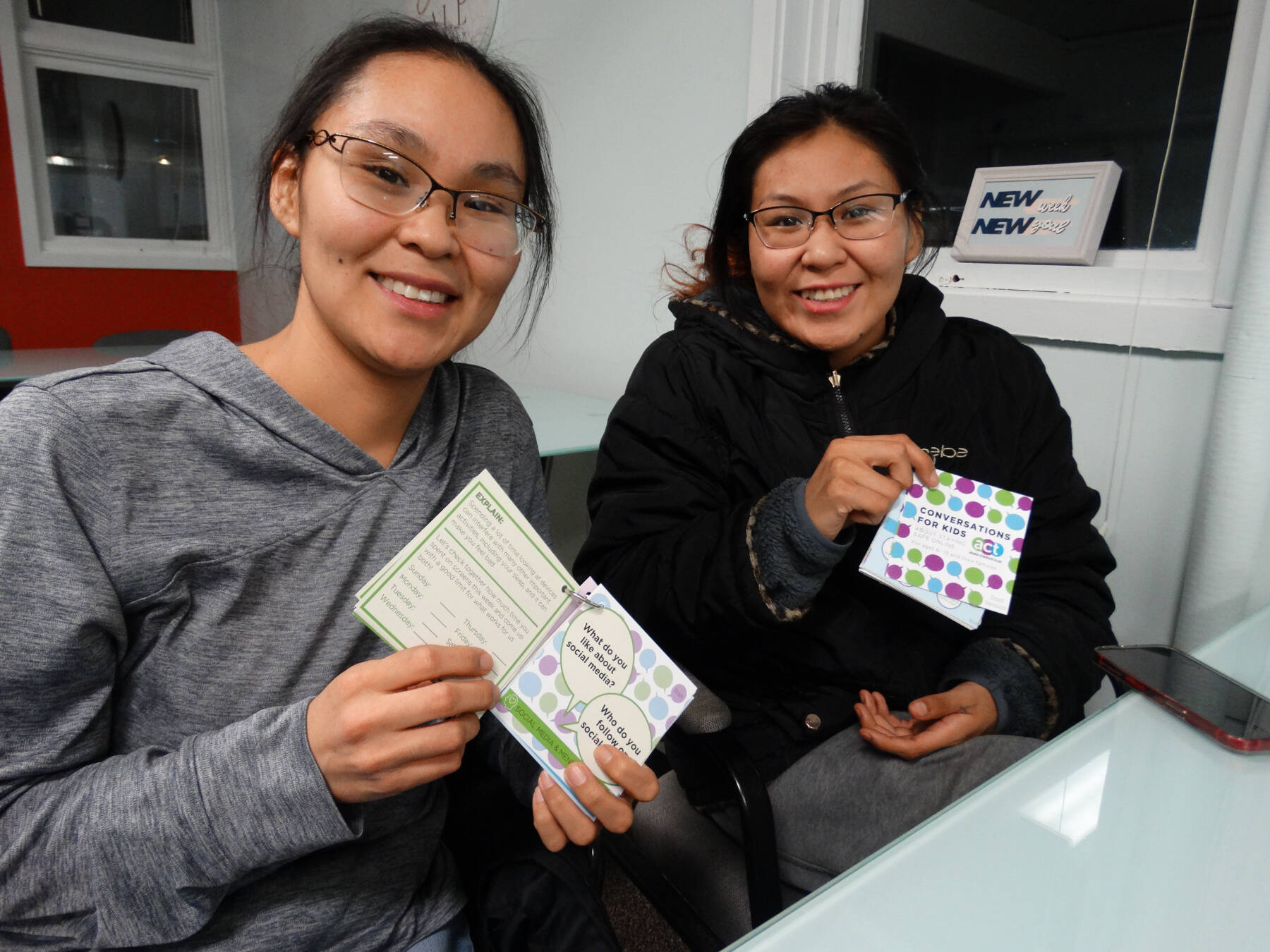 Photo courtesy Kaila Pfister
A parent and teen use conversation cards created by the Alaska Children’s Trust.