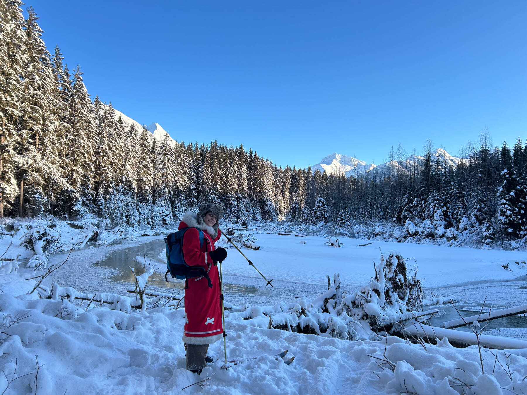 Kelby Randall makes the most of a rare sunny morning by going cross country skiing on the Herbert Glacier trail in Juneau<ins>, Alaska</ins> on Thursday, Dec. 11<ins>, 2025</ins>. (Chloe Anderson/Peninsula Clarion)