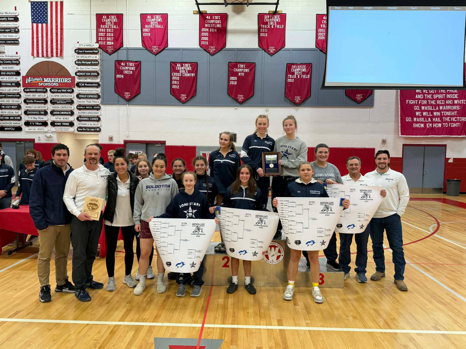 The Soldotna High School girls wrestling team is photographed after the Northern Lights Conference in Wasilla<ins>, Alaska</ins> on Saturday, Dec. 13<ins>, 2025</ins>. SoHi sent 11 girls to regionals, and nine will compete in the state tournament at the Alaska Airlines Center this weekend in Anchorage. Photo courtesy of Soldotna High School Athletics