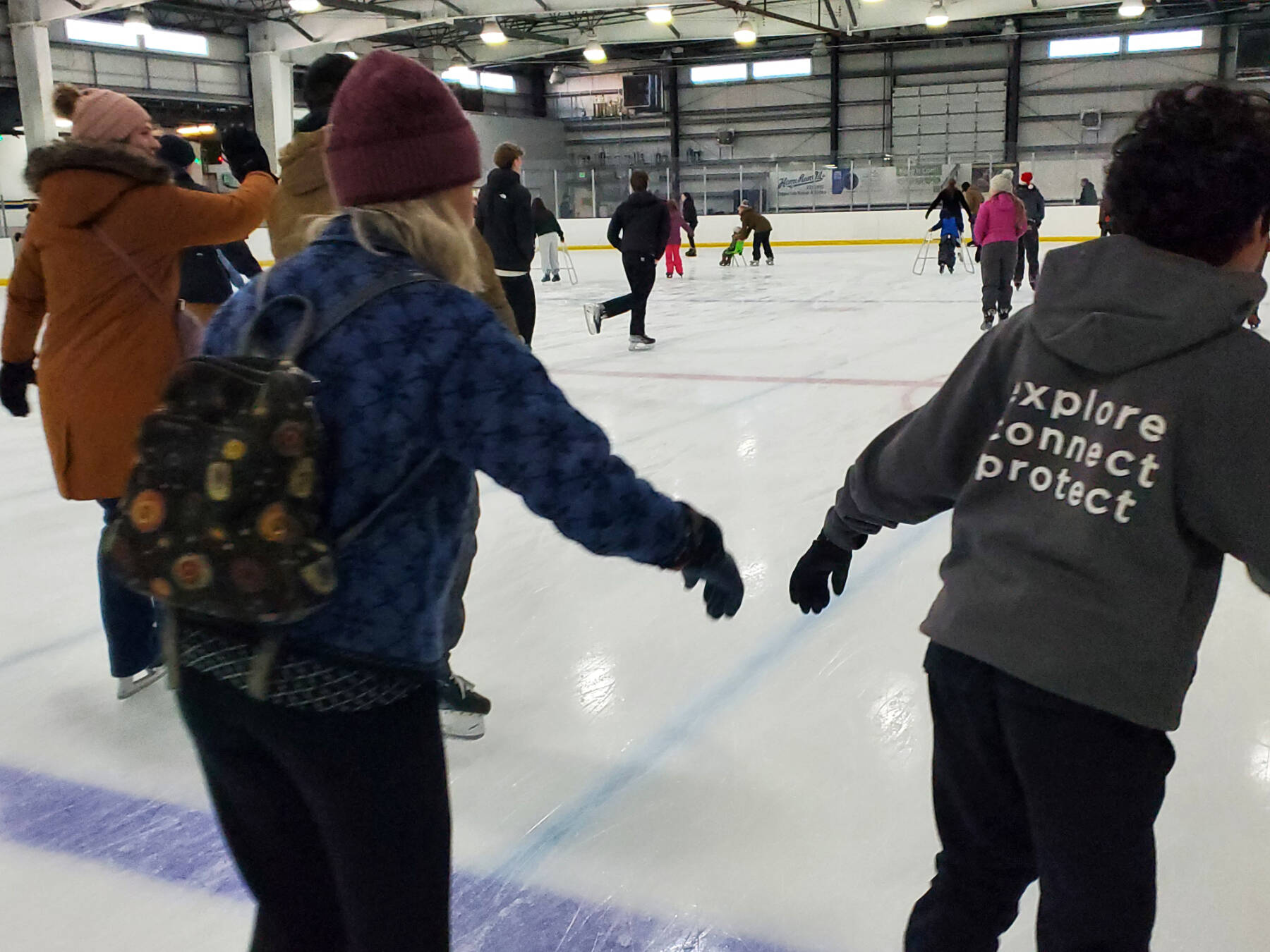 Community members enjoy skating at Kevin Bell Arena during the Christmas Eve community free skate on Wednesday, Dec. 24, 2025, in Homer, Alaska. (Delcenia Cosman/Homer News)