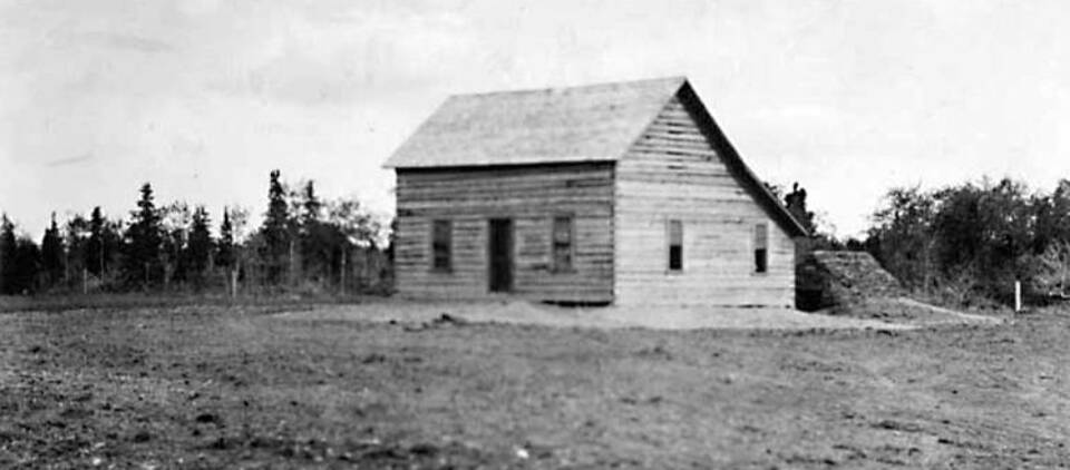 Images from the Rasmuson Library historical archives at the University of Alaska Fairbanks
Kenai Station superintendent Hans P. Nielsen finished construction of his quarters/office building in early 1901. Seen here that year, the log structure is in its earliest stage of completion, with its upper-story window and its stove pipe.