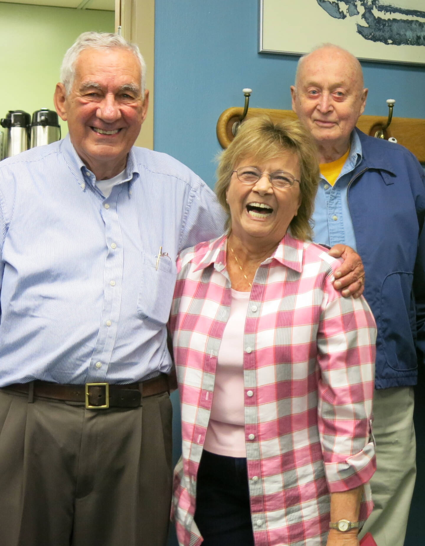 Photo by Ned Rozell
At the Elvey Building, home of UAFs Geophysical Institute, Carl Benson, far right, and Val Scullion of the GI business office attend a 2014 retirement party with Glenn Shaw.