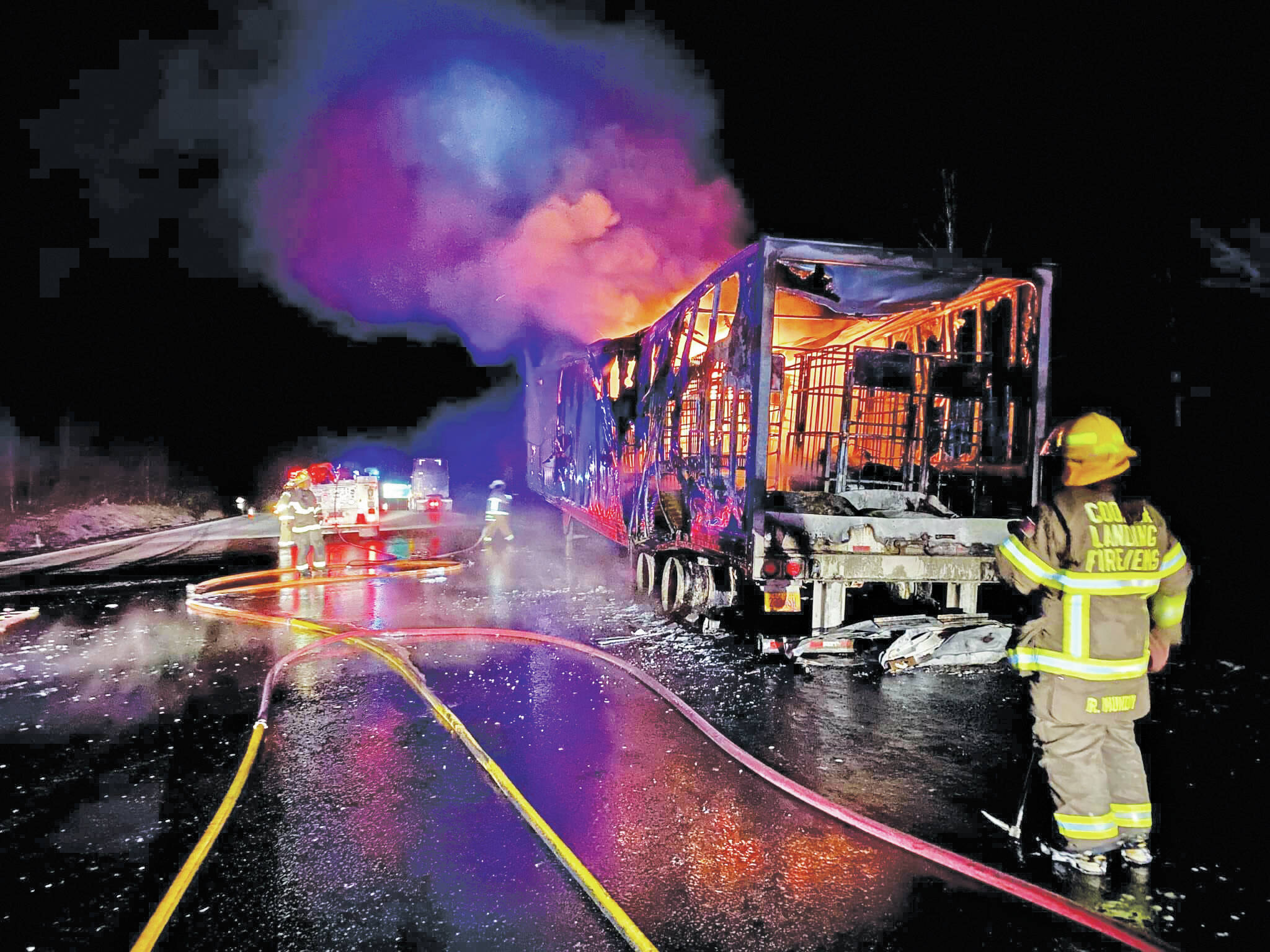 Cooper Landing Fire and Emergency Medical Services respond to a trailer fire on Tuesday, April 26, 2022, near Mile 38 Seward Highway near Cooper Landing, Alaska. The fire destroyed the trailer carrying U.S. Mail from Anchorage to the Southern Kenai Peninsula. (Photo courtesy of Cooper Landing Fire and EMS)