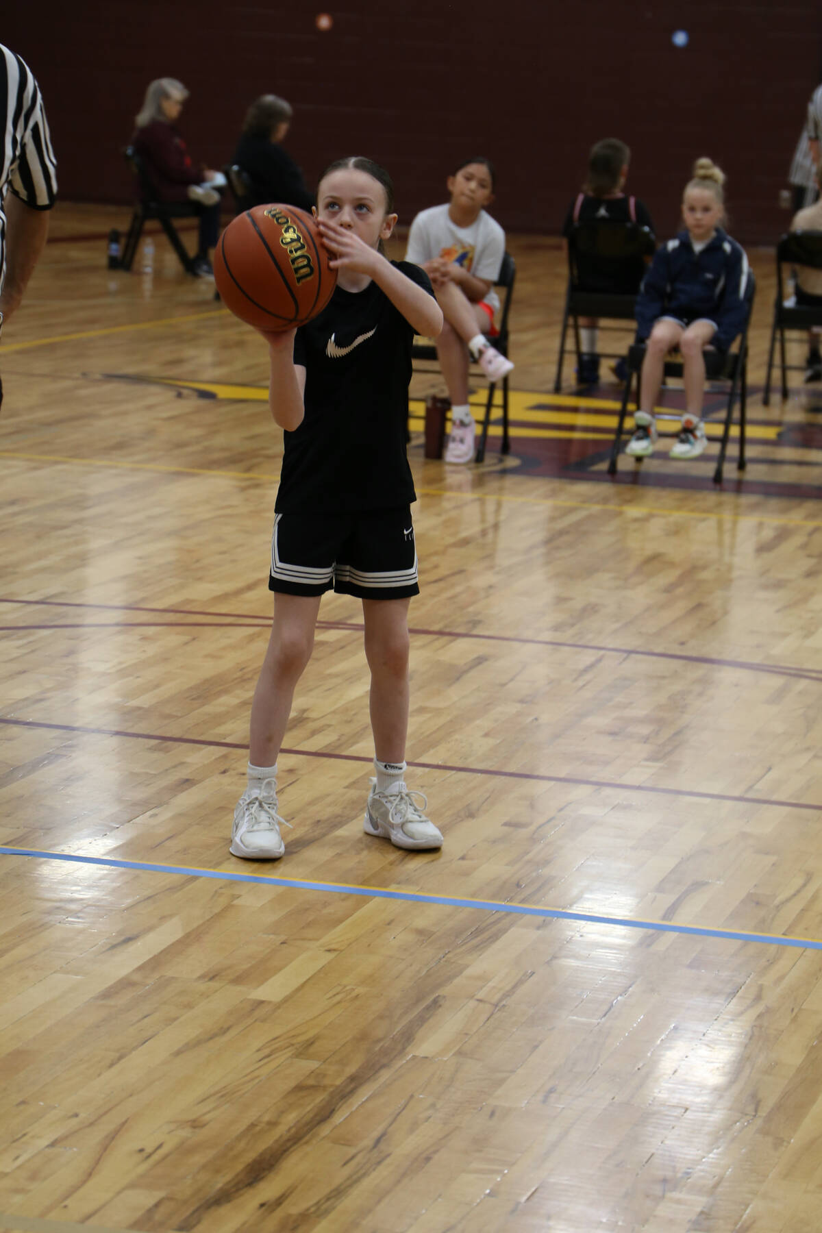 Laila Taylor prepares to shoot a free throw during the Elks National Hoop Shoot semi-finals in Nampa, Idaho on March 15, 2025. (Photo provided by Amber Rouswell)