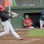 Oilers Grant Woods hits a double against the Chugiak-Eagle River Chinooks in the second inning Thursday, June 21, 2018, at Coral Seymour Memorial Park in Kenai. (Photo by Jeff Helminiak/Peninsula Clarion)