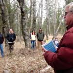 Dr. Alan Boraas, professor of anthropology at Kenai Peninsula College, leads a tour of Kalifornsky Villagein May 2015. The Native settlement was abandoned in the 1920s but is still home to a rich cultural history. (Photo courtesy of Jenny Neyman/Redoubt Reporter)
