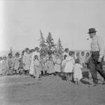 This historical photograph shows doctor Linus Hiram French with orphans of the Spanish flu epidemic in 1919. (Photo courtesy of Tim Troll)