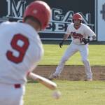 Peninsula Oilers infielder Jake Darrow keeps an eye on teammate Tyler Duke in a June 8, 2018, Alaska Baseball League game against the Anchorage Bucs at Coral Seymour Memorial Ballpark in Kenai. (Photo by Joey Klecka/Peninsula Clarion)