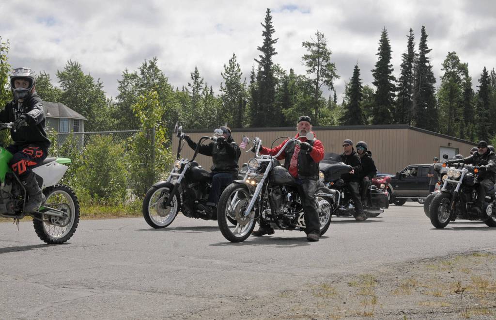 Motorcyclists line up as part of a procession to Travis Stubblefields memorial service at the driveway of the Harley-Davidson Motorcycles store on Saturday, June 30, 2018 in Soldotna, Alaska. Stubblefield, a lifelong resident of the Soldotna area, was killed June 21 in a conflict in Kasilof. Alaska State Troopers are investigating the circumstances of his death, though no charges have yet been filed. (Photo by Elizabeth Earl/Peninsula Clarion)