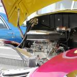 A restored classic car owned by Irv Carlisle sits in a parking lot alongside other restored classic cars at a Kaknu Kruzers car show at Autozone on Saturday, June 30, 2018 in Soldotna, Alaska. The Kaknu Kruzers, a local club composed of members who restore classic cars, will participate in a number of parades and shows this summer, including Soldotnas Progress Days parade on July 28. (Photo by Elizabeth Earl/Peninsula Clarion)