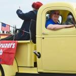 Members of the Kaknu Kruzers Car Club lead a procession of vintage vehicles in the Kenai Fourth of July parade on Wednesday, July 4, 2018 in Kenai, Alaska. (Ben Boettger/Peninsula Clarion).
