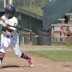 Harold Ochea of the Twins takes a cut at the ball Wednesday, July 5, 2018, at Coral Seymour Memorial Park in Kenai. (Photo by Jeff Helminiak/Peninsula Clarion)