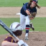 Legion Twins pitcher Logan Smith unleashes a throw Friday afternoon against a Dimond batter at Coral Seymour Memorial Ballpark. (Photo by Joey Klecka/Peninsula Clarion)
