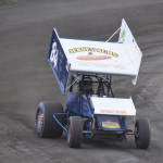 The No. 84 Sprint Car of Jimmie Hale slides through a curve Saturday night at Twin City Raceway in Kenai. (Photo by Joey Klecka/Peninsula Clarion)