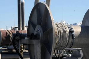 This May 15, 2017 photo shows a drift gillnet reel on the back of a commercial fishing vessel docked in the Homer small boat harbor in Homer, Alaska. (Elizabeth Earl/Peninsula Clarion)