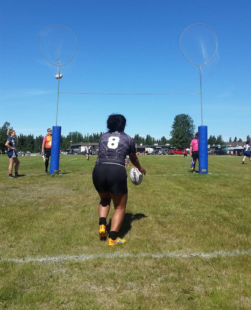 Aurora Rams player Lolohea Toki kicks an extra point Saturday at the Between the Tides Dipfest Rugby 10s tournament at Spur View field in Kenai. (Photo by Joey Klecka/Peninsula Clarion)