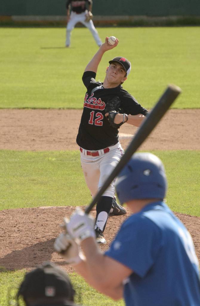 Peninsula Oilers pitcher Matt Amrhein unleashes a pitch Friday against the Anchorage Glacier Pilots at Coral Seymour Memorial Park in Kenai. (Photo by Joey Klecka/Peninsula Clarion)