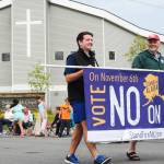 Participants in Stand for Alaskas float in the Progress Days parade make their way down Marydale Avenue on Saturday, July 28, 2018 in Soldotna, Alaska. The parade kicks off the weekend-long event celebrating Soldotnas history, with a market on Saturday and Sunday in Soldotna Creek Park and a concert Saturday night followed by a free community barbecue Sunday. (Photo by Elizabeth Earl/Peninsula Clarion)
