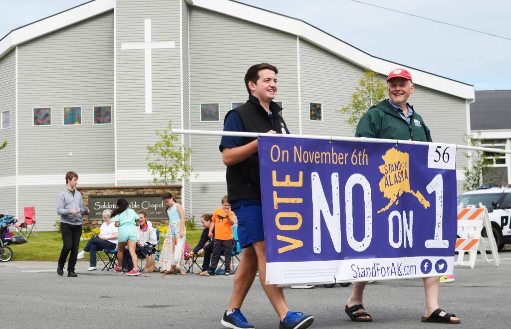 Participants in Stand for Alaskas float in the Progress Days parade make their way down Marydale Avenue on Saturday, July 28, 2018 in Soldotna, Alaska. The parade kicks off the weekend-long event celebrating Soldotnas history, with a market on Saturday and Sunday in Soldotna Creek Park and a concert Saturday night followed by a free community barbecue Sunday. (Photo by Elizabeth Earl/Peninsula Clarion)
