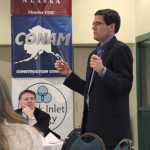 Steve Butt, senior project manager for the Alaska LNG Project, talks about the progress of the project at the 2014 Kenai Industry Update Forum at the Challenger Learning Center of Alaska in Kenai on Jan. 30, 2014.