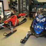 Photo by Dan Balmer Peninsula Clarion Two 2013 Polaris RMK Assaults on display at Peninsula Powersports. The listed price tag for the snowmachine is $12,499.