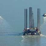 Peninsula Clarion file photo Tugs pull the Spartan 151 jack-up drilling rig up Cook Inlet in August 2011. New oil and gas development in the inlet, along with major projects planned for the area, could mean a boom for the Kenai Peninsula economy.