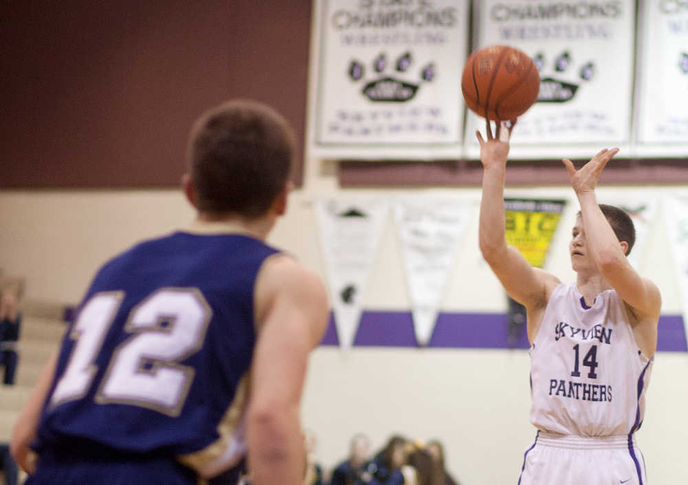 Photo by Rashah McChesney/Peninsula Clarion Skyview's Bailey Jones shoots from the three-point line during their game against Homer Friday Feb. 28, 2014 in Soldotna, Alaska.