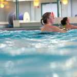 Photo by Rashah McChesney/Peninsula Clarion   About 20 people jumped in the pool Saturday March 1, 2014 to participate in an Aqua Zumba class held weekly at the Nikiski Pool in Nikiski, Alaska.