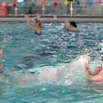 Photo by Rashah McChesney/Peninsula Clarion  Charlotte Coots leads an Aqua Zumba class Saturday March 1, 2014 at the Nikiski Pool in Nikiski, Alaska. Typically the new class is held at the pool Tuesday and Thursday mornings, but Coots said the Saturday exhibition class was designed to raise awareness about the class.