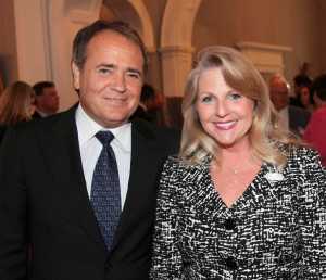 FILE - This May 5, 2011 file photo provided by the office of the Governor of Virginia shows Jonnie Williams left, and Maureen McDonnell, wife of then Gov. Bob McDonnell, during a reception for a NASCAR race at the Executive Mansion in Richmond, Va. Former Virginia Gov. Bob McDonnell and his wife were indicted Tuesday, Jan. 21, 2014, on corruption charges after a monthslong federal investigation into gifts the Republican received from Williams.  (AP Photo/Office of the Governor of Virginia, Michele White, File)