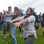 Photo by Rashah McChesney/Peninsula Clarion  Audience members dance through a haze of bubbles during The Big Wu's show Friday July 2, 2013 at Salmonstock in Ninilchik, Alaska.